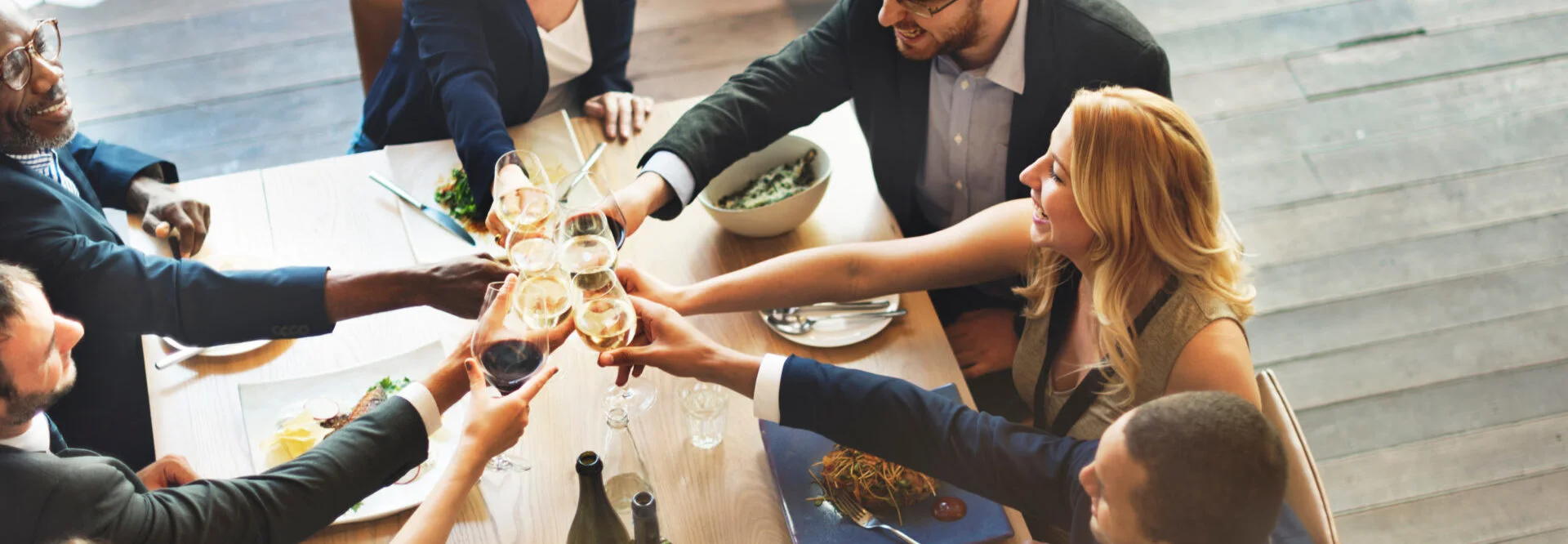 People celebrating over dinner