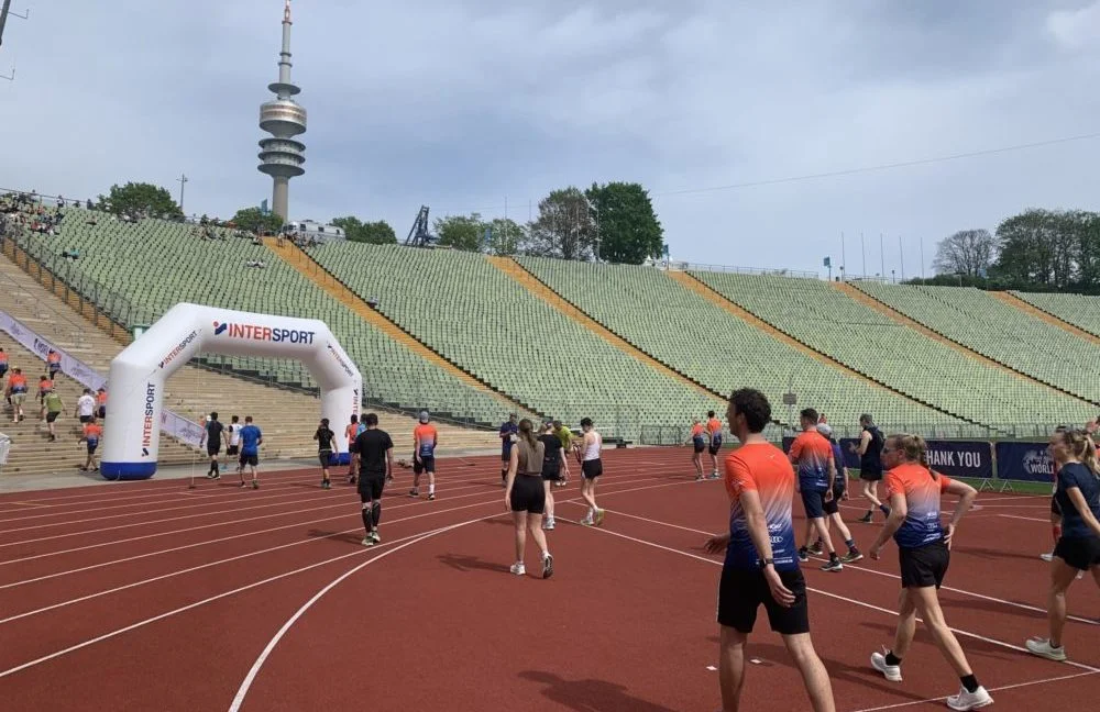 People running around a race track