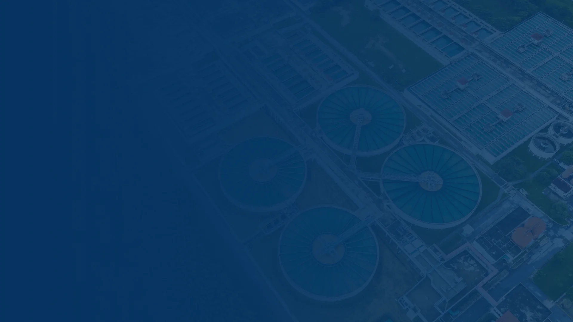 Aerial view of a water treatment facility and surrounding infrastructure